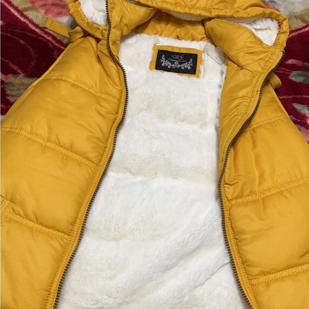 A yellow vest never worn